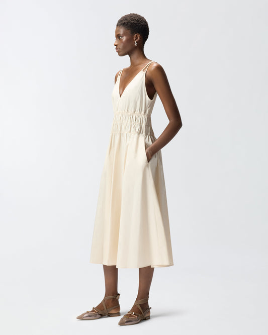Sleeveless midi dress with pleats and gathering