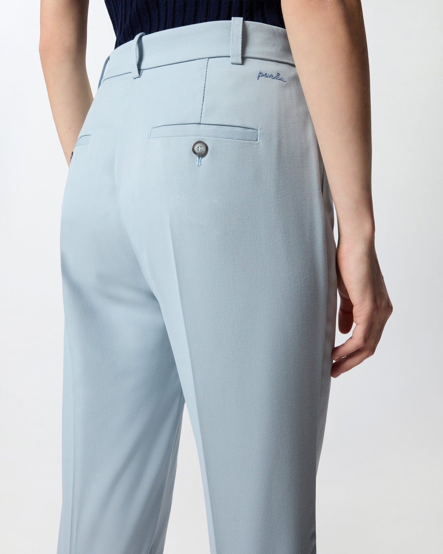 Flared trousers with pressed pleat detail