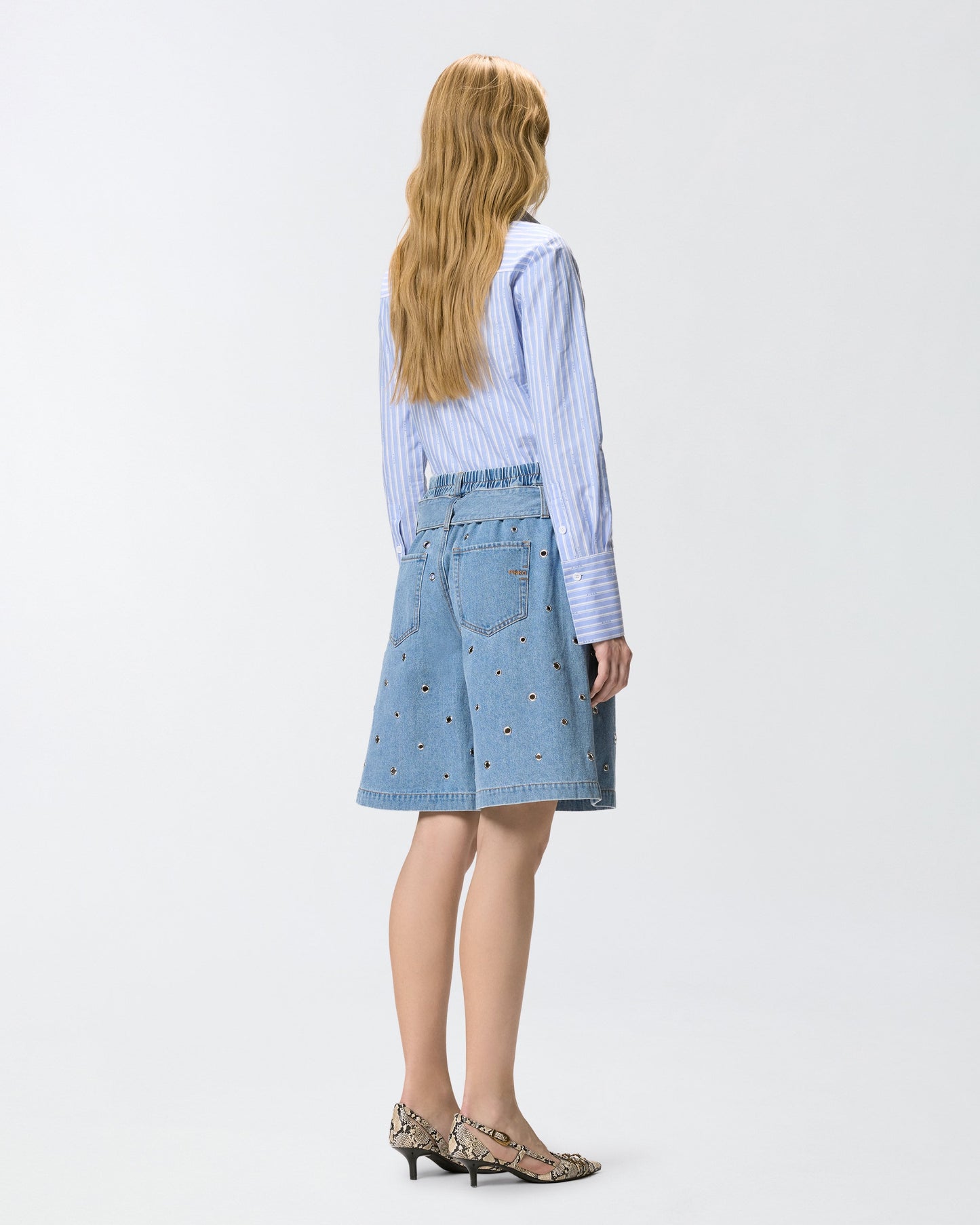 Denim shorts with eyelets and belt