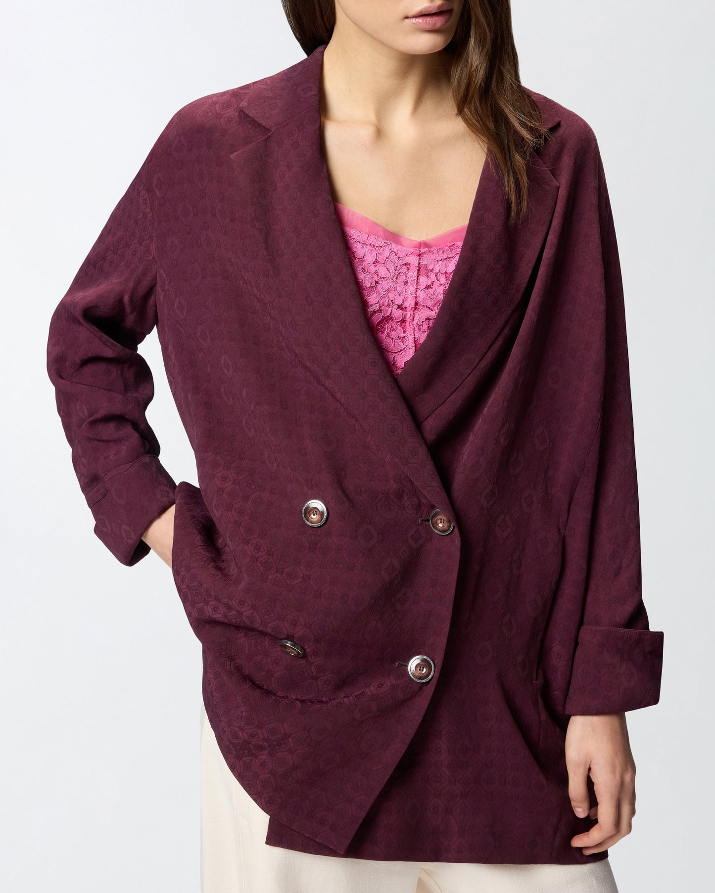 Double-breasted jacket with tie motif