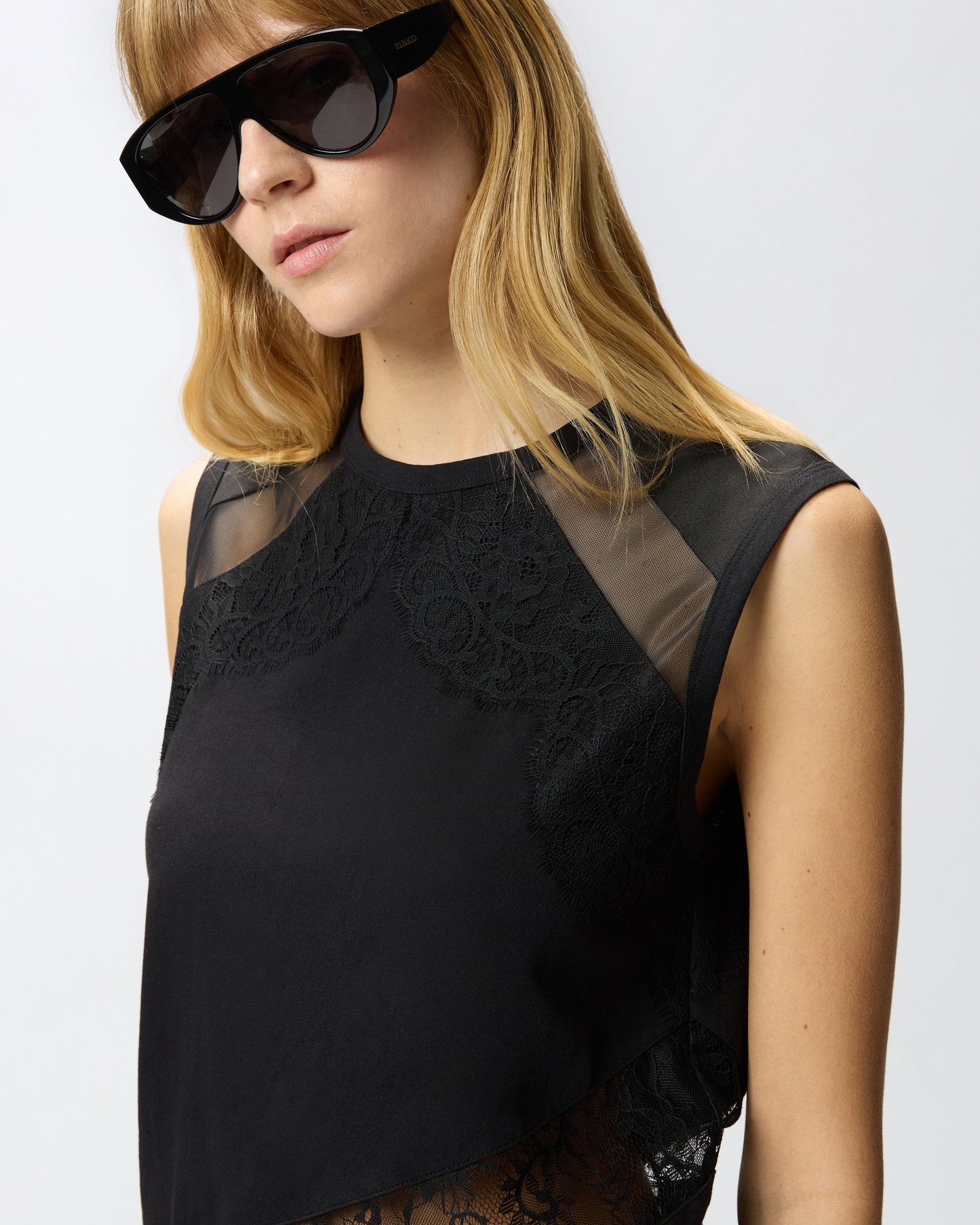 Sleeveless top with lace details