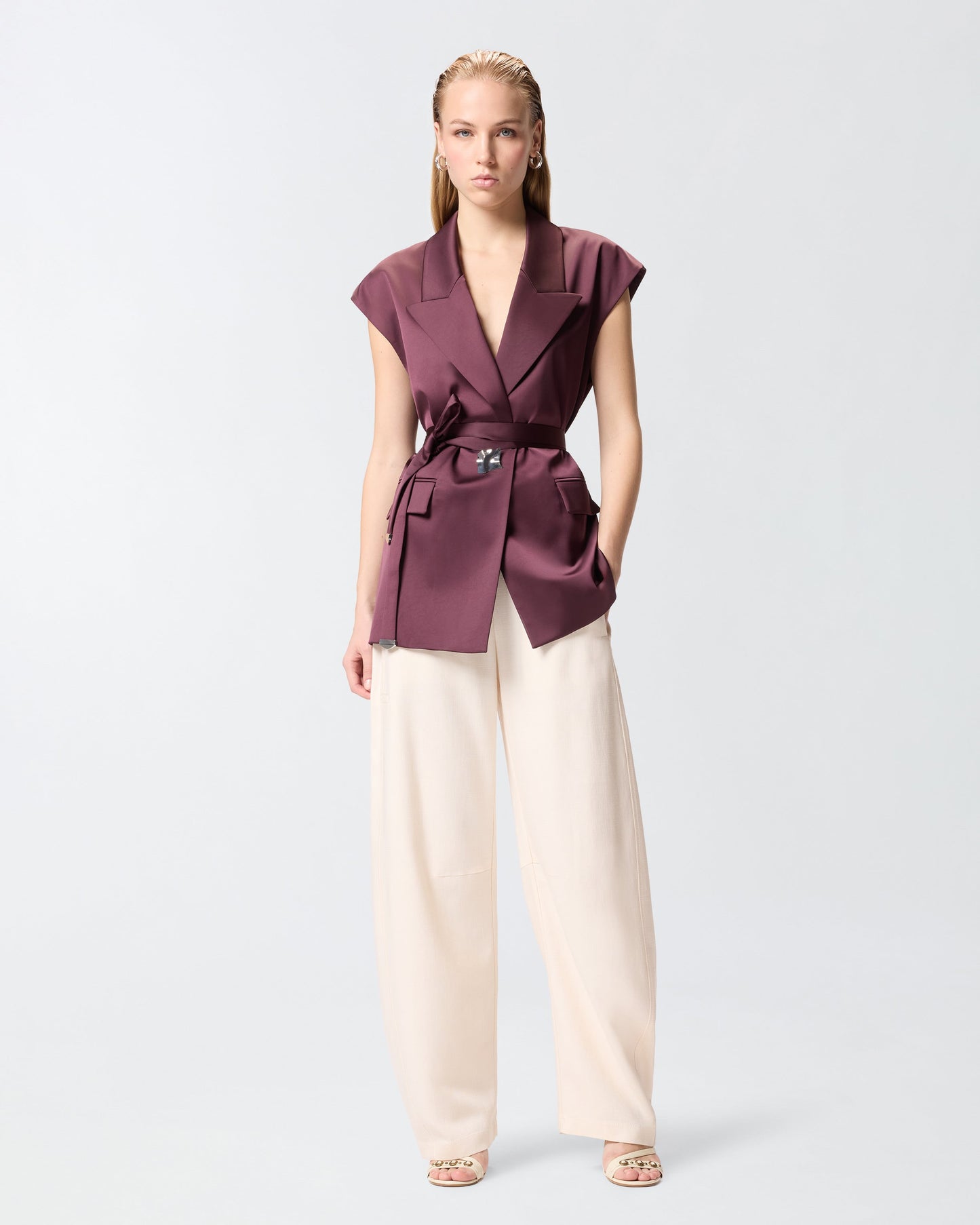 Sleeveless jacket in satin