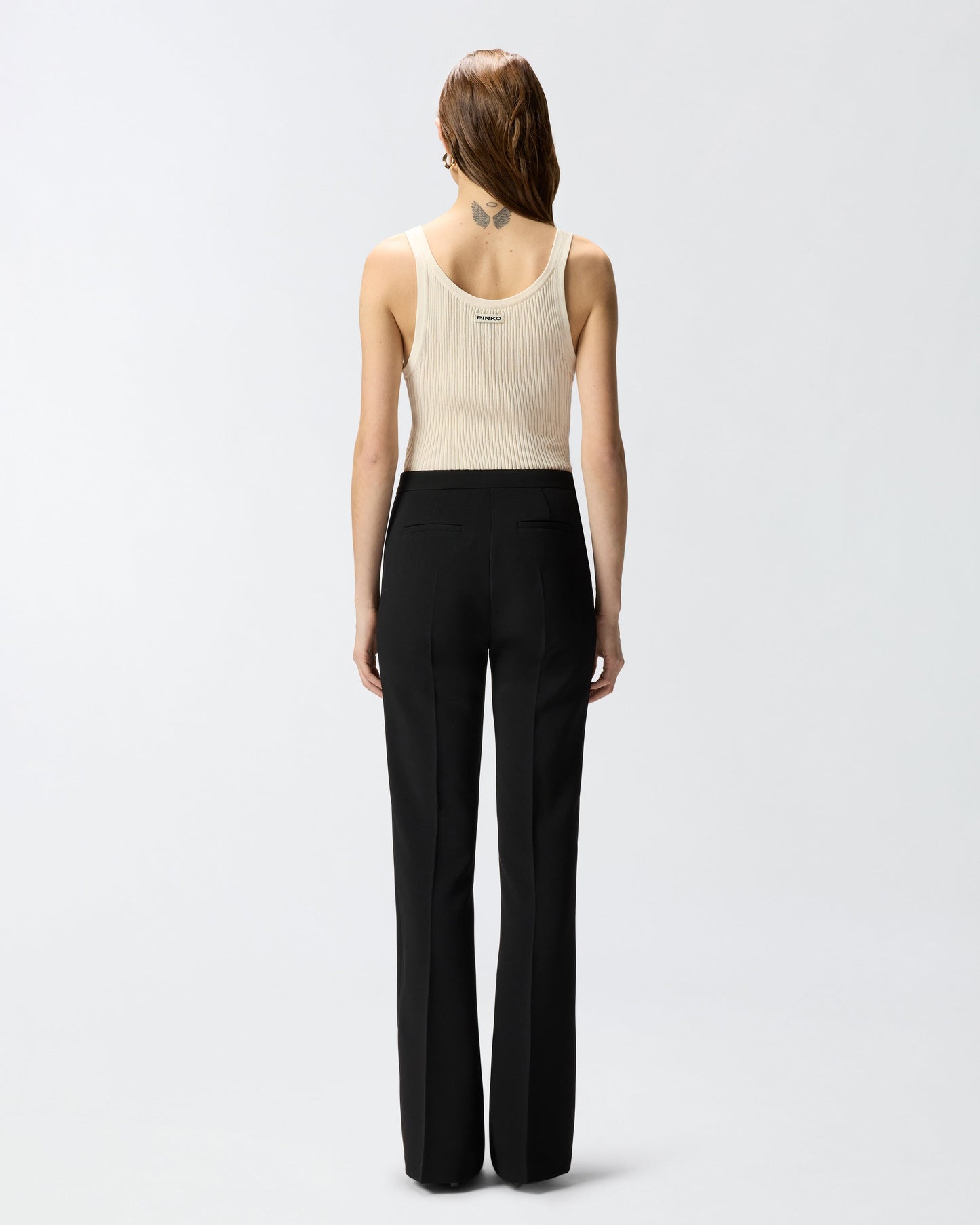 Trousers with pressed pleat detail