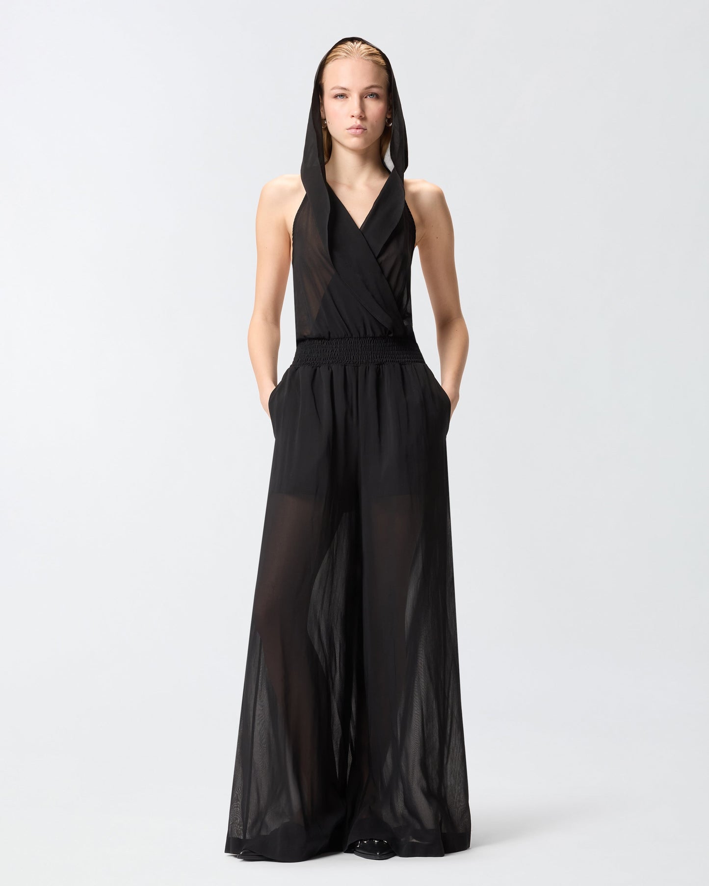 Long playsuit with hood and sheer details