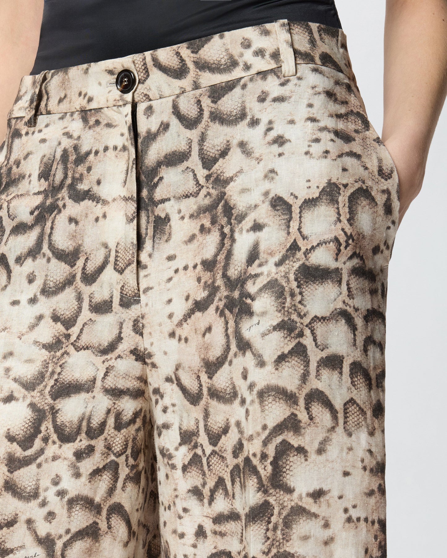 Bermuda shorts with snake print