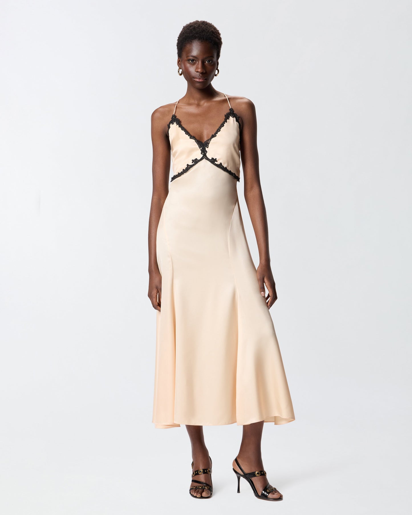 Long dress with lace inserts