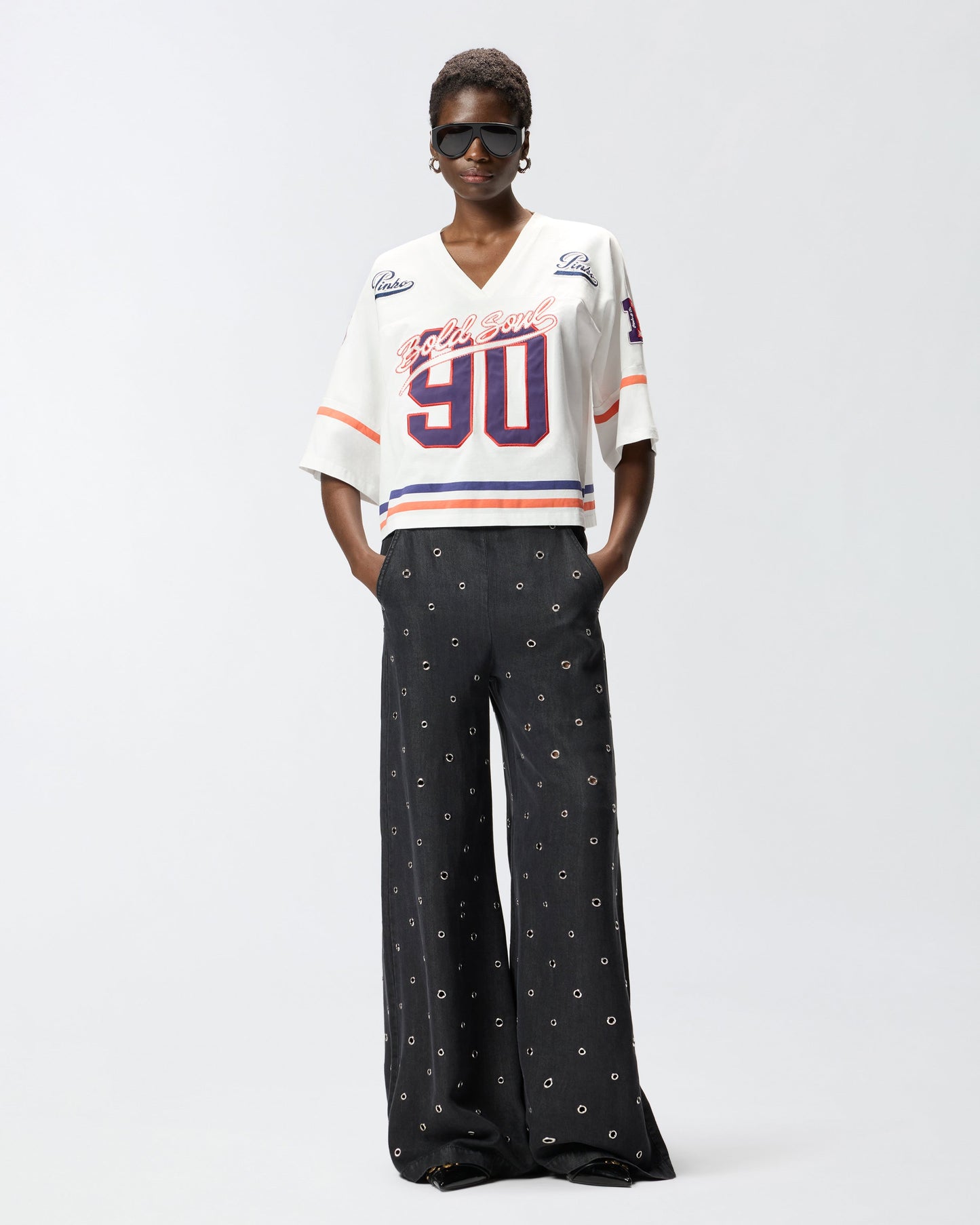 Cropped T-shirt with V-neck and branded patches