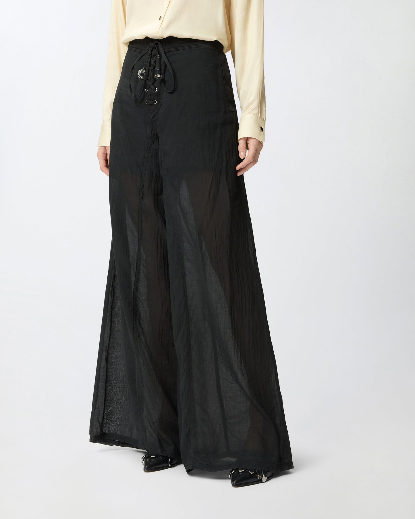 Lightweight trousers with laces and Texan details