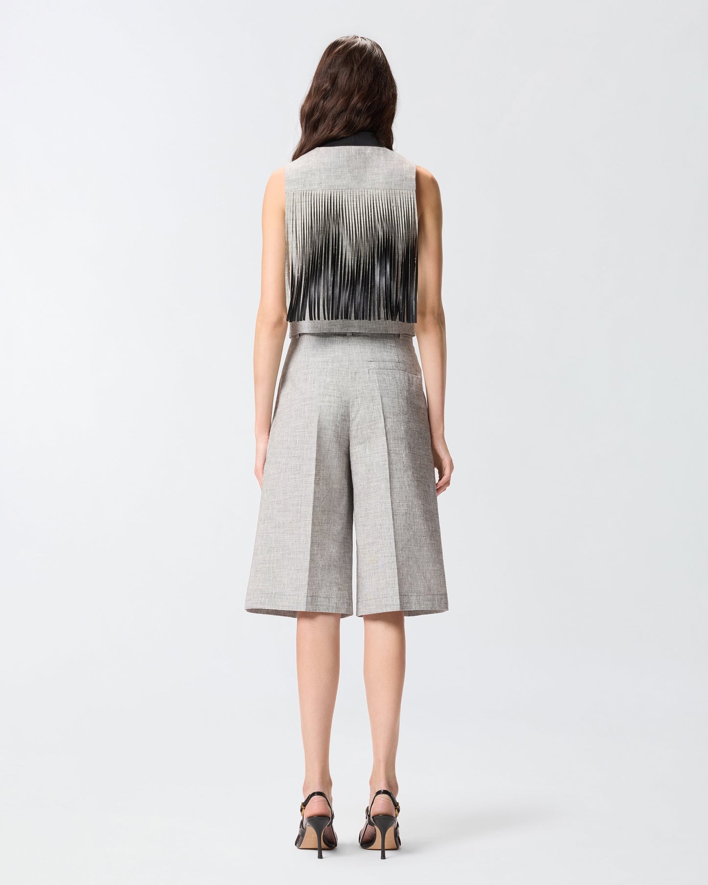 Vest with fringing