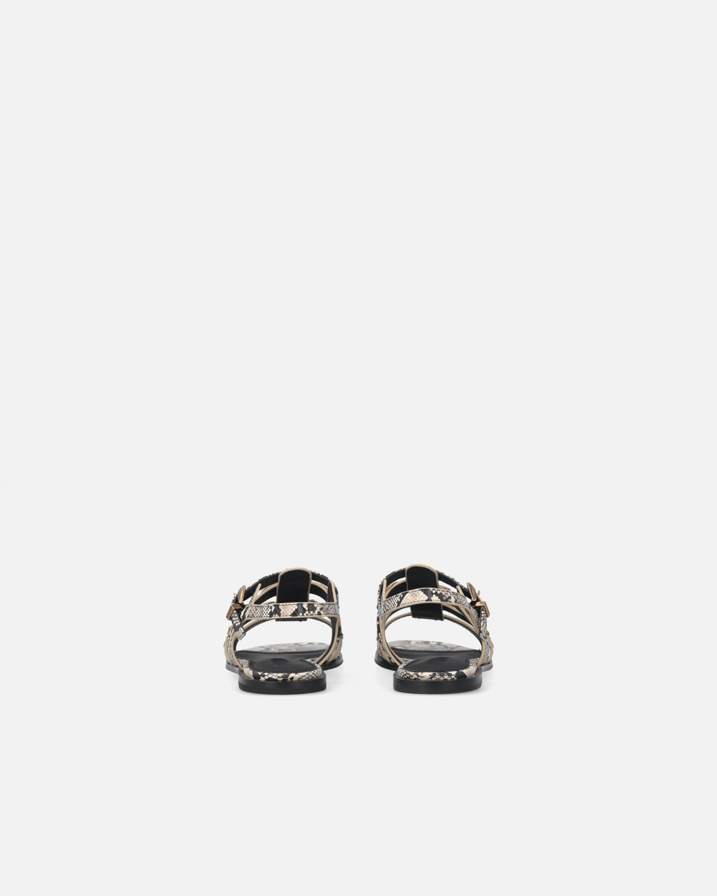 Flat leather sandals with python print and studs