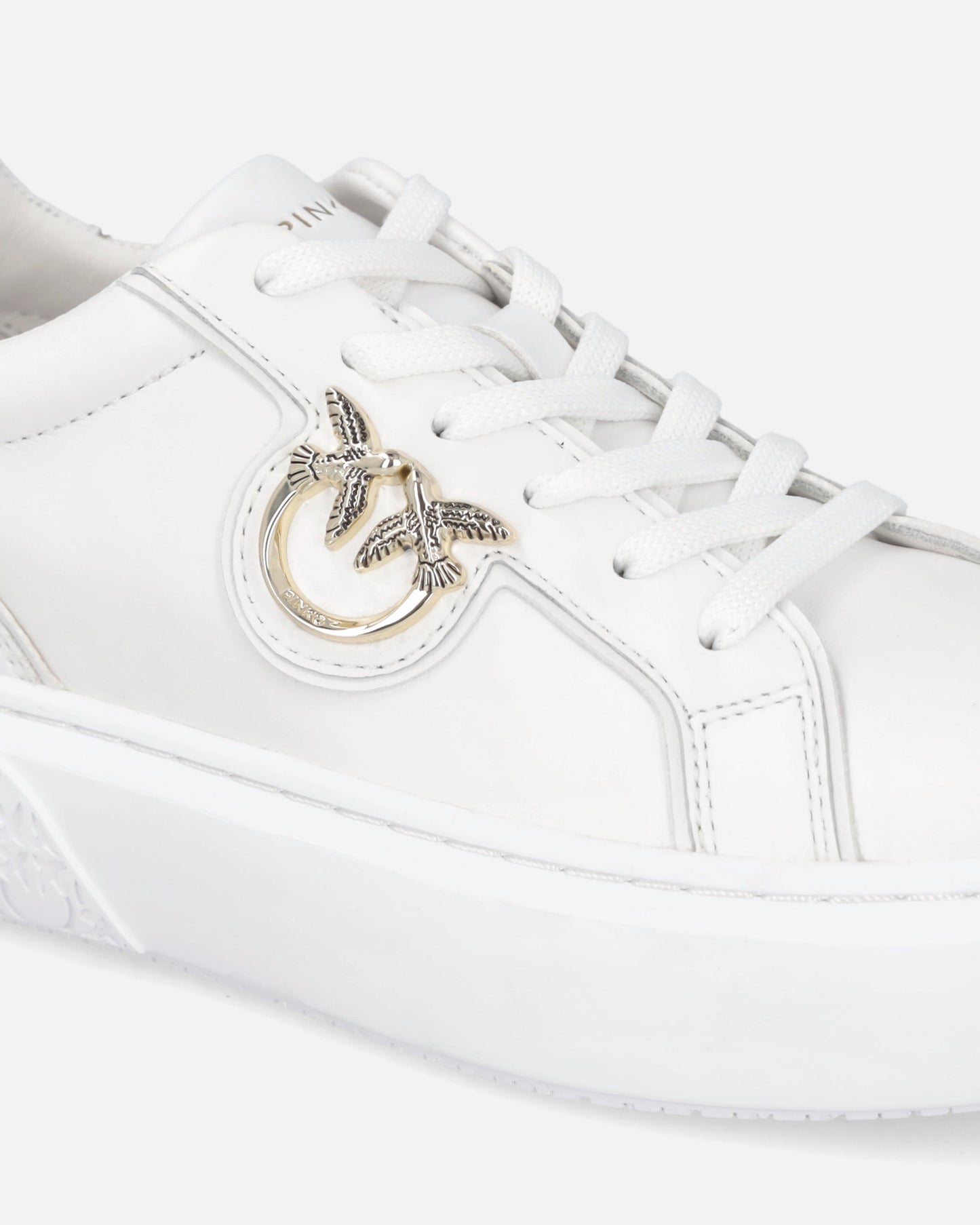 High-soled flatform sneakers with metal logo